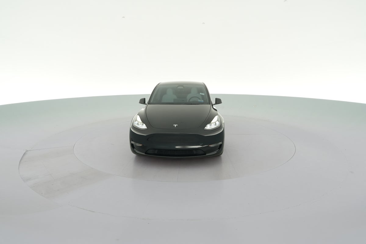 2023 Tesla Model Y Performance All-Wheel Drive in Solid Black — 360° view 1