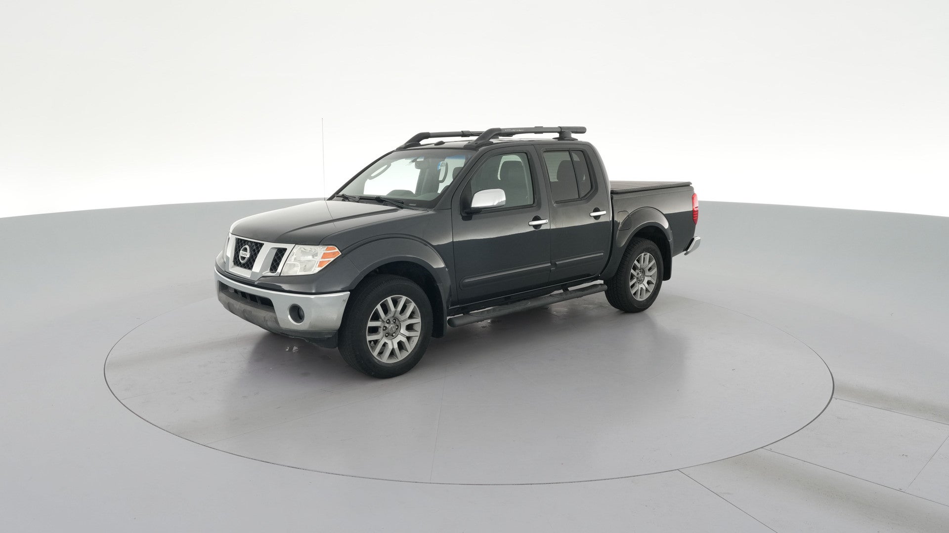 2010 Nissan Frontier Crew Cab vehicle photo