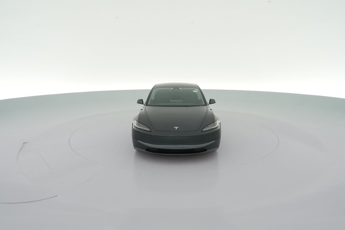 2025 Tesla Model 3 Long Range Rear-Wheel Drive in Stealth Grey — 360° view 1