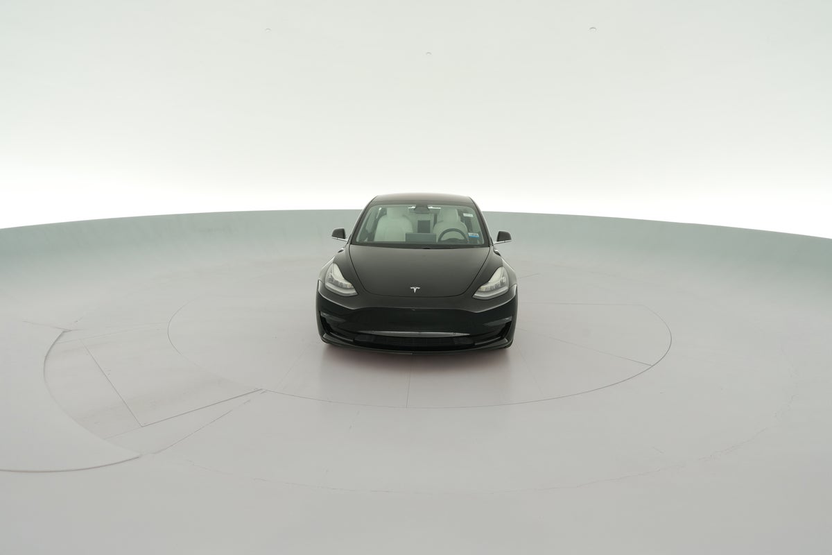 2018 Tesla Model 3 Mid Range Rear-Wheel Drive in Solid Black — 360° view 1