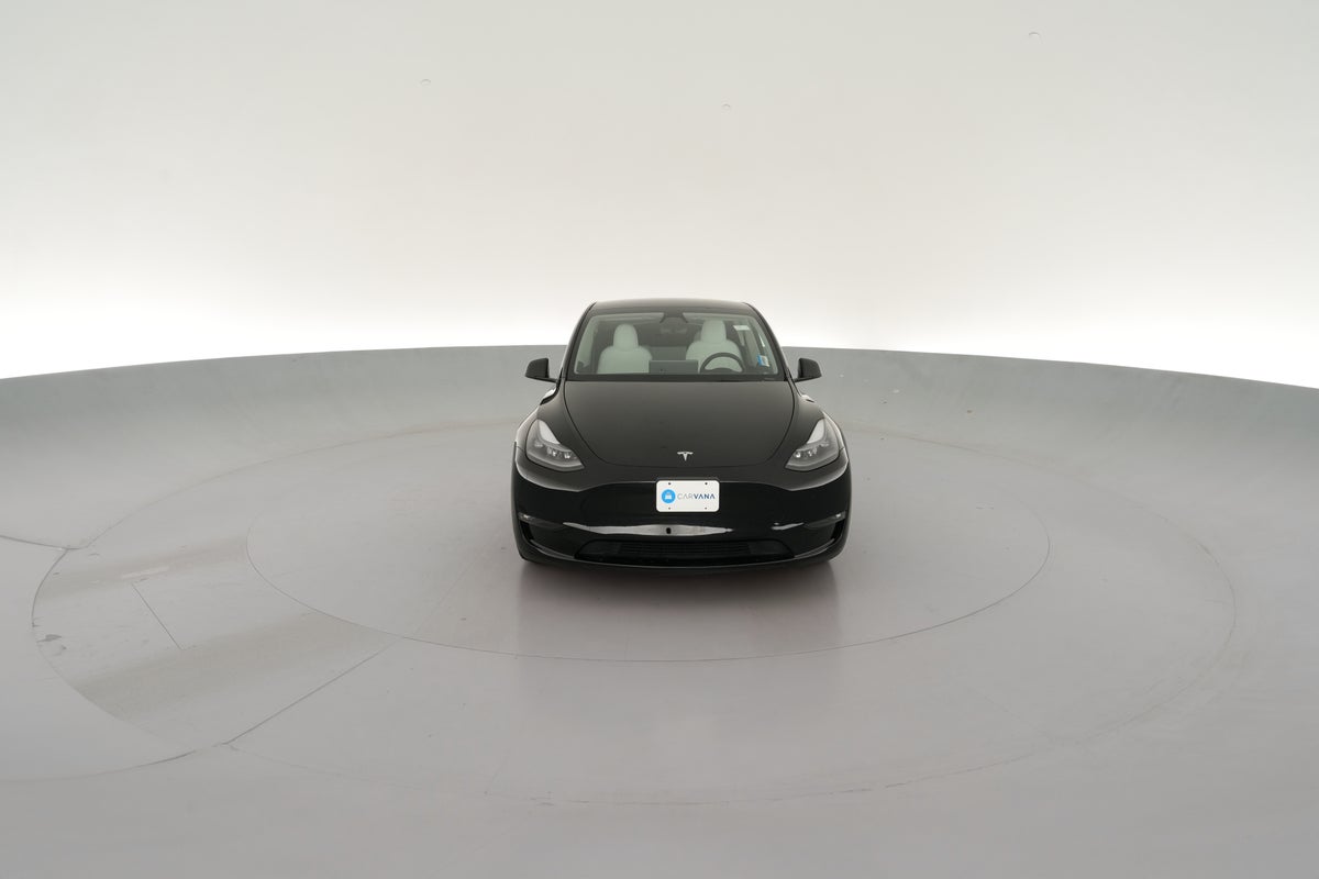 2023 Tesla Model Y Performance All-Wheel Drive in Solid Black — 360° view 1