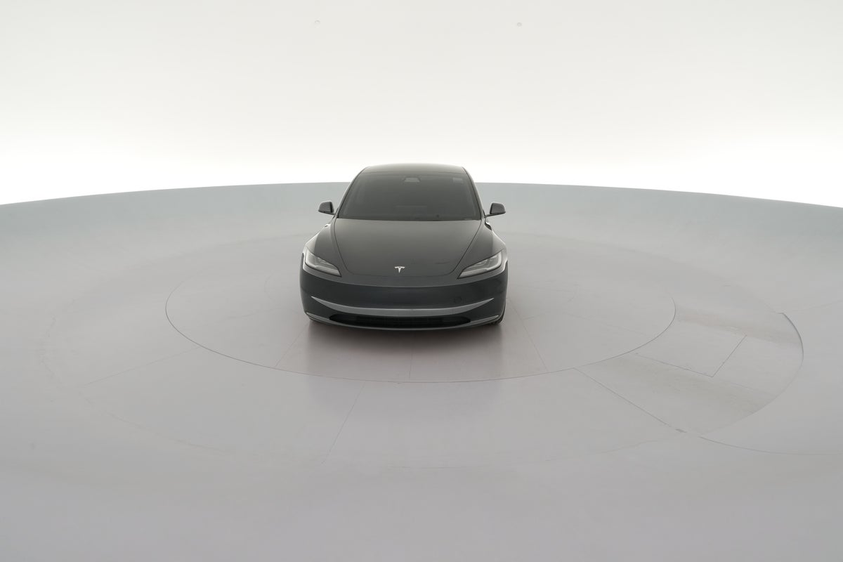 2025 Tesla Model 3 Long Range Rear-Wheel Drive in Stealth Grey — 360° view 1