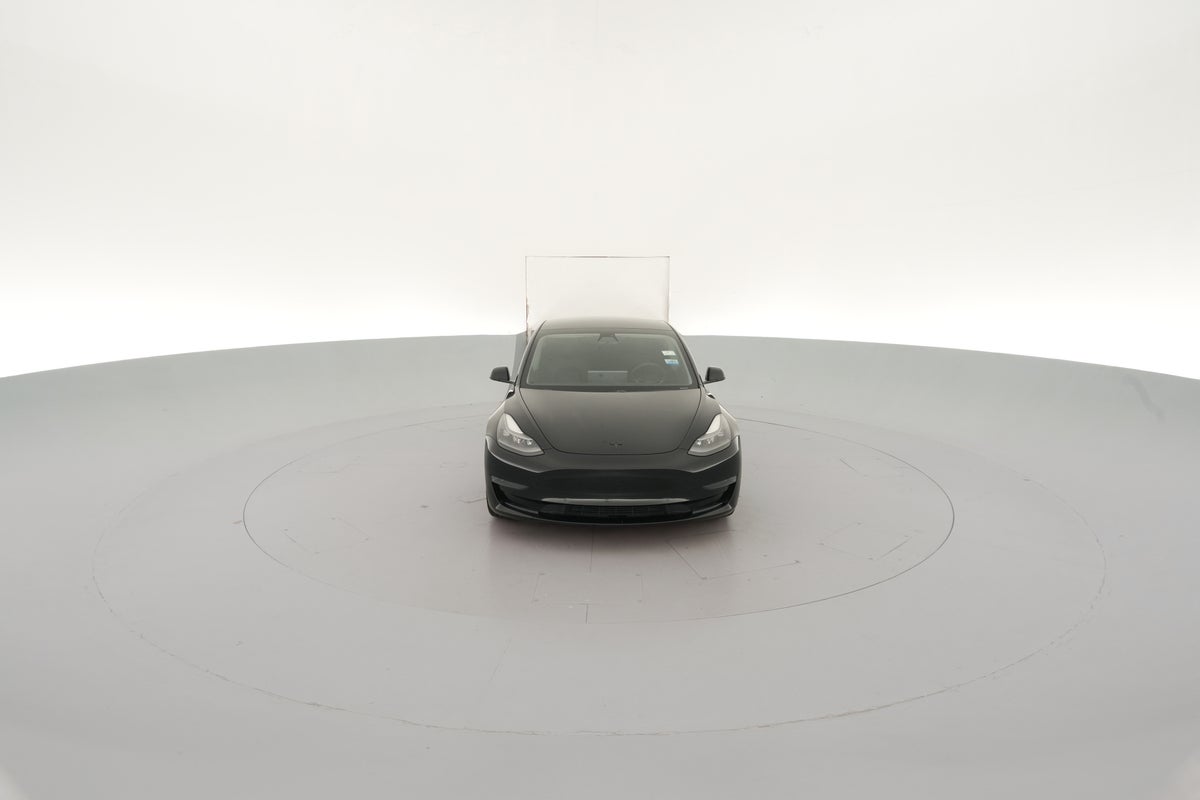 2021 Tesla Model 3 Standard Range Plus in Solid Black — 360° view 1