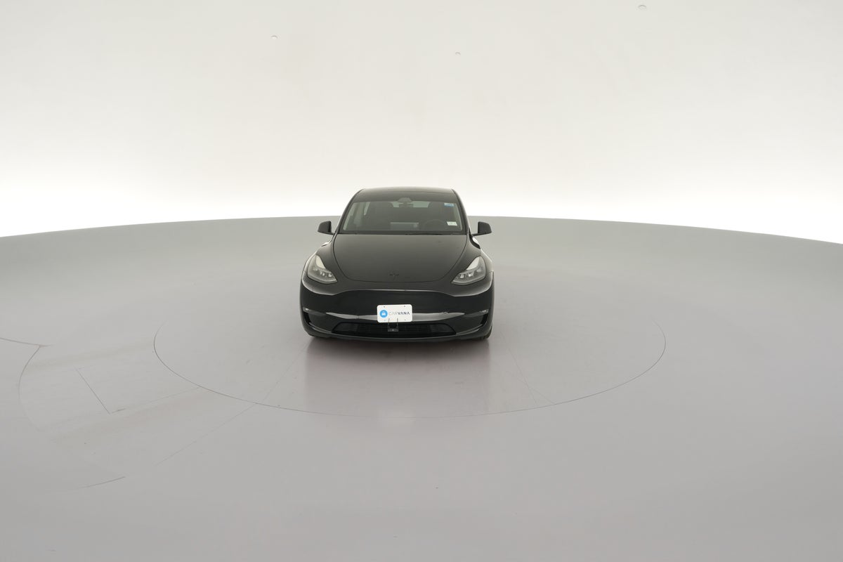 2024 Tesla Model Y Performance All-Wheel Drive in Solid Black — 360° view 1