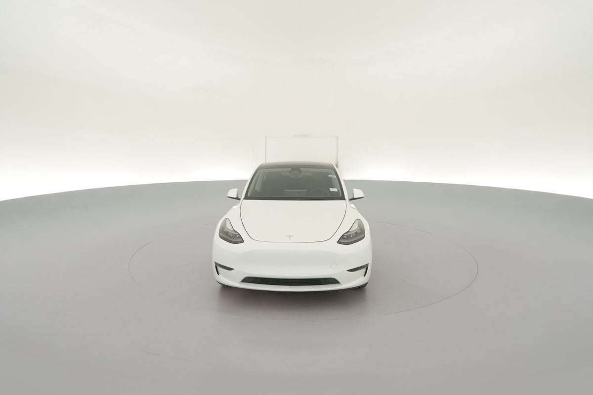 2025 Tesla Model Y Long Range All-Wheel Drive in Pearl White — 360° view 1