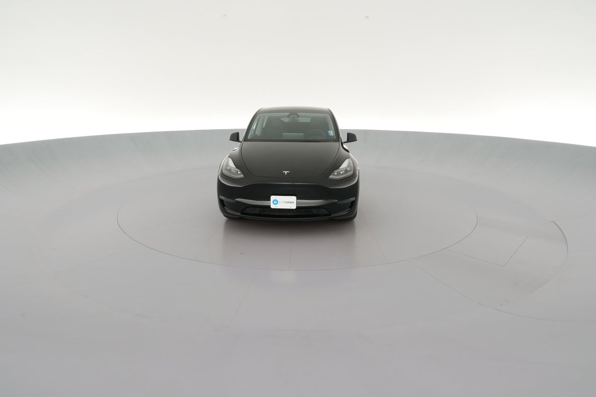 2024 Tesla Model Y Long Range All-Wheel Drive in Solid Black — 360° view 1