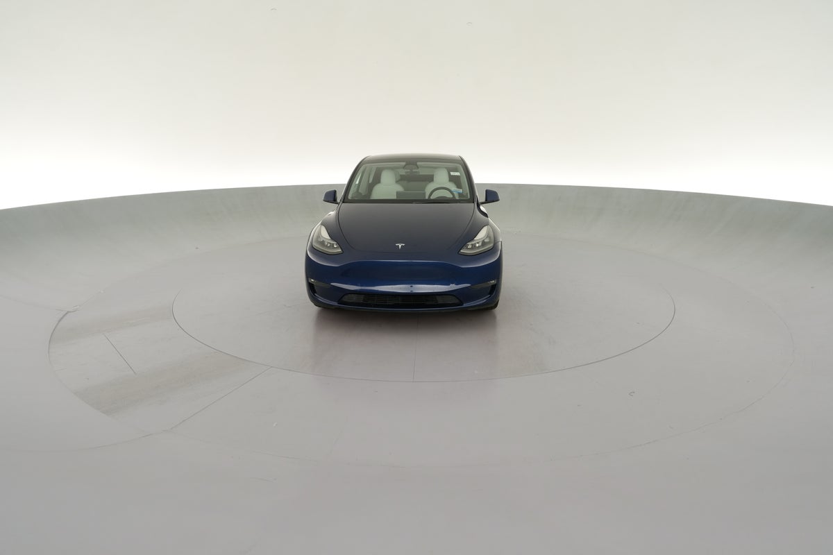 2023 Tesla Model Y Performance All-Wheel Drive in Deep Blue Metallic — 360° view 1