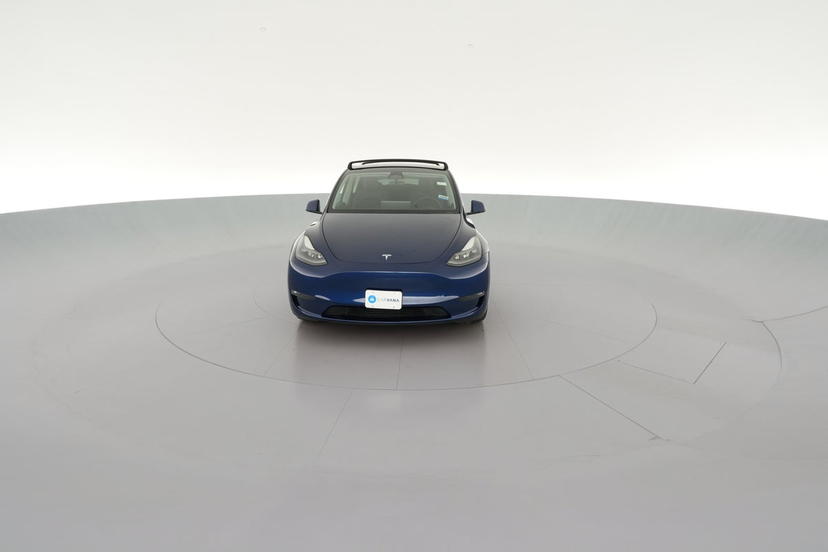 2023 Tesla Model Y Performance All-Wheel Drive in Deep Blue Metallic — 360° view 1