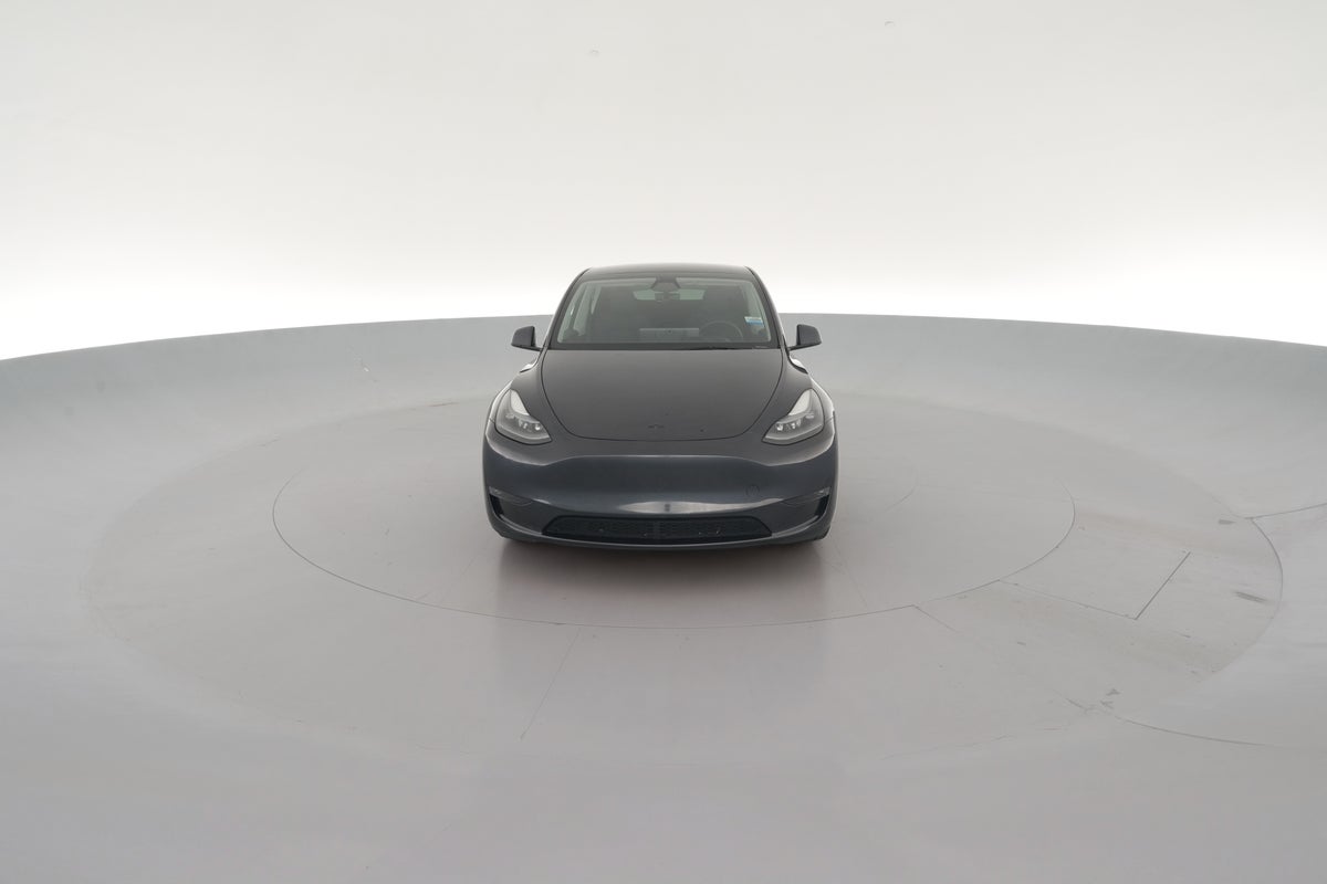 2025 Tesla Model Y Long Range All-Wheel Drive in Stealth Grey — 360° view 1