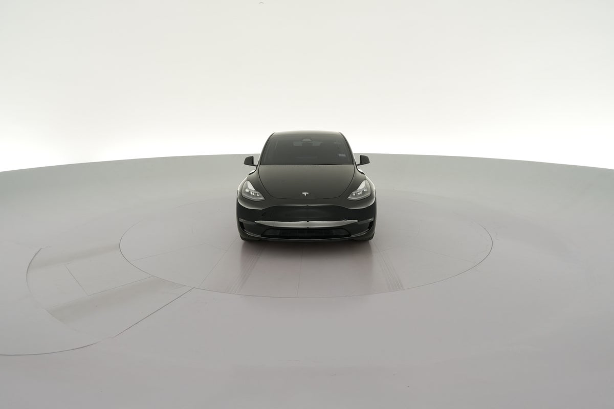 2024 Tesla Model Y Long Range All-Wheel Drive in Solid Black — 360° view 1