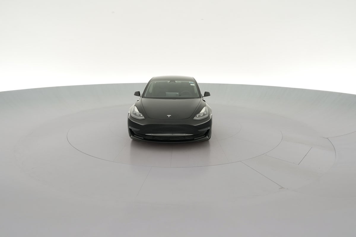 2021 Tesla Model 3 Standard Range Plus in Solid Black — 360° view 1