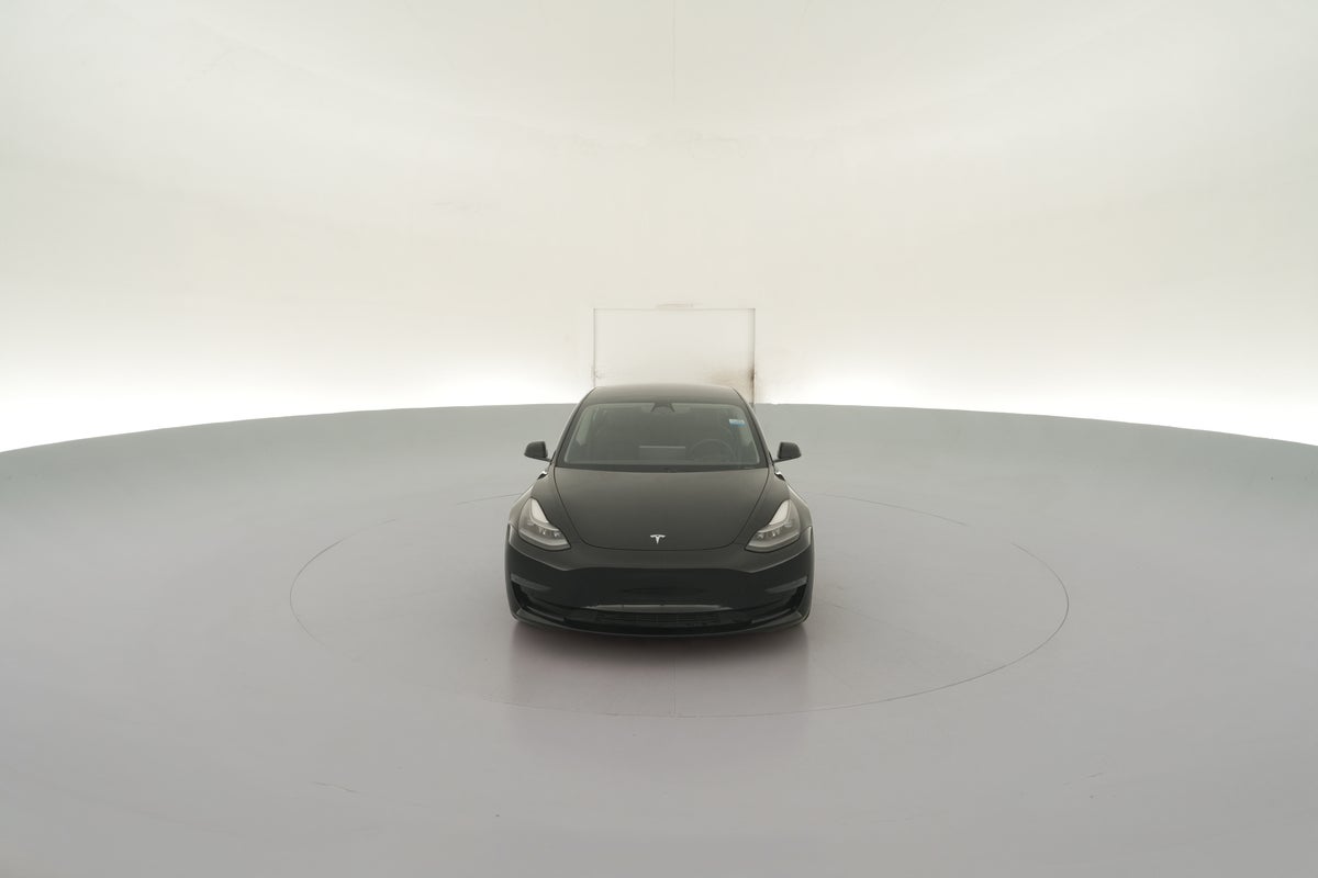 2021 Tesla Model 3 Standard Range Plus in Solid Black — 360° view 1