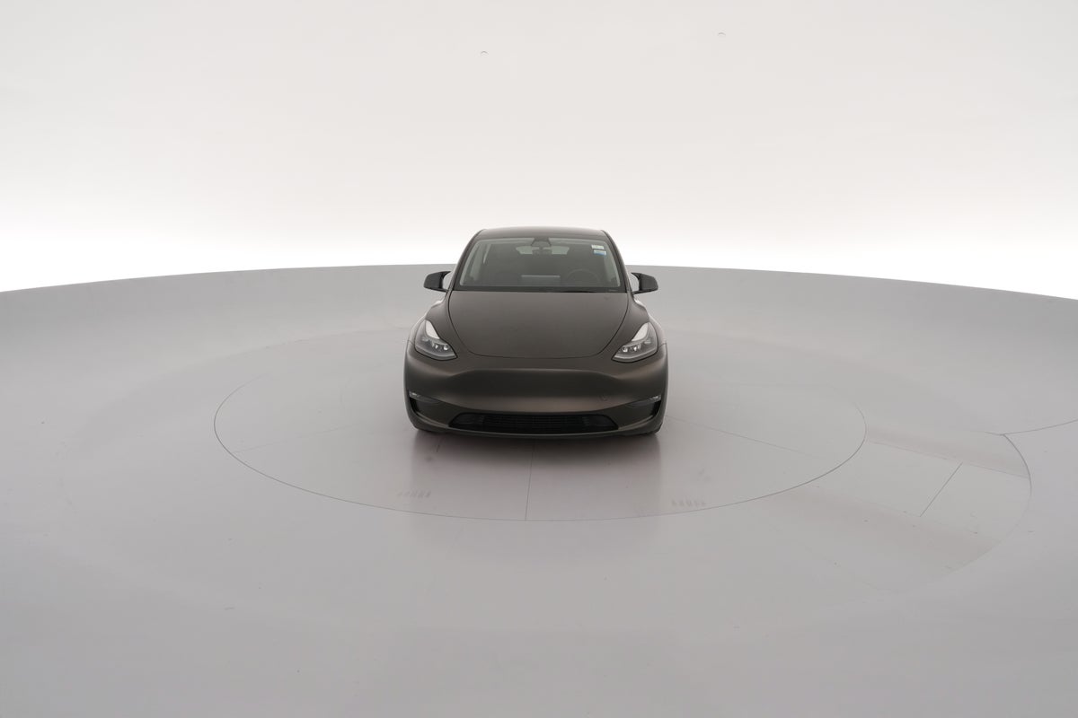 2023 Tesla Model Y Performance All-Wheel Drive in Solid Black — 360° view 1