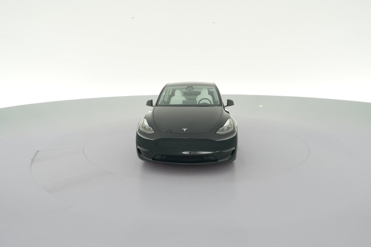 2024 Tesla Model Y Performance All-Wheel Drive in Solid Black — 360° view 1