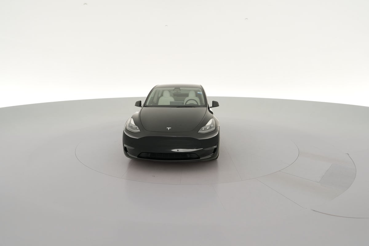 2023 Tesla Model Y Performance All-Wheel Drive in Solid Black — 360° view 1