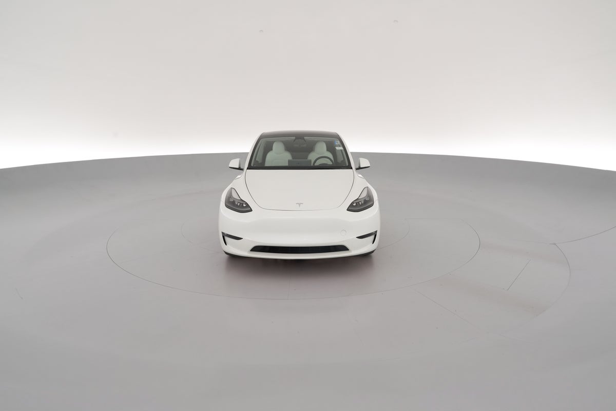 2023 Tesla Model Y Performance All-Wheel Drive in Pearl White — 360° view 1