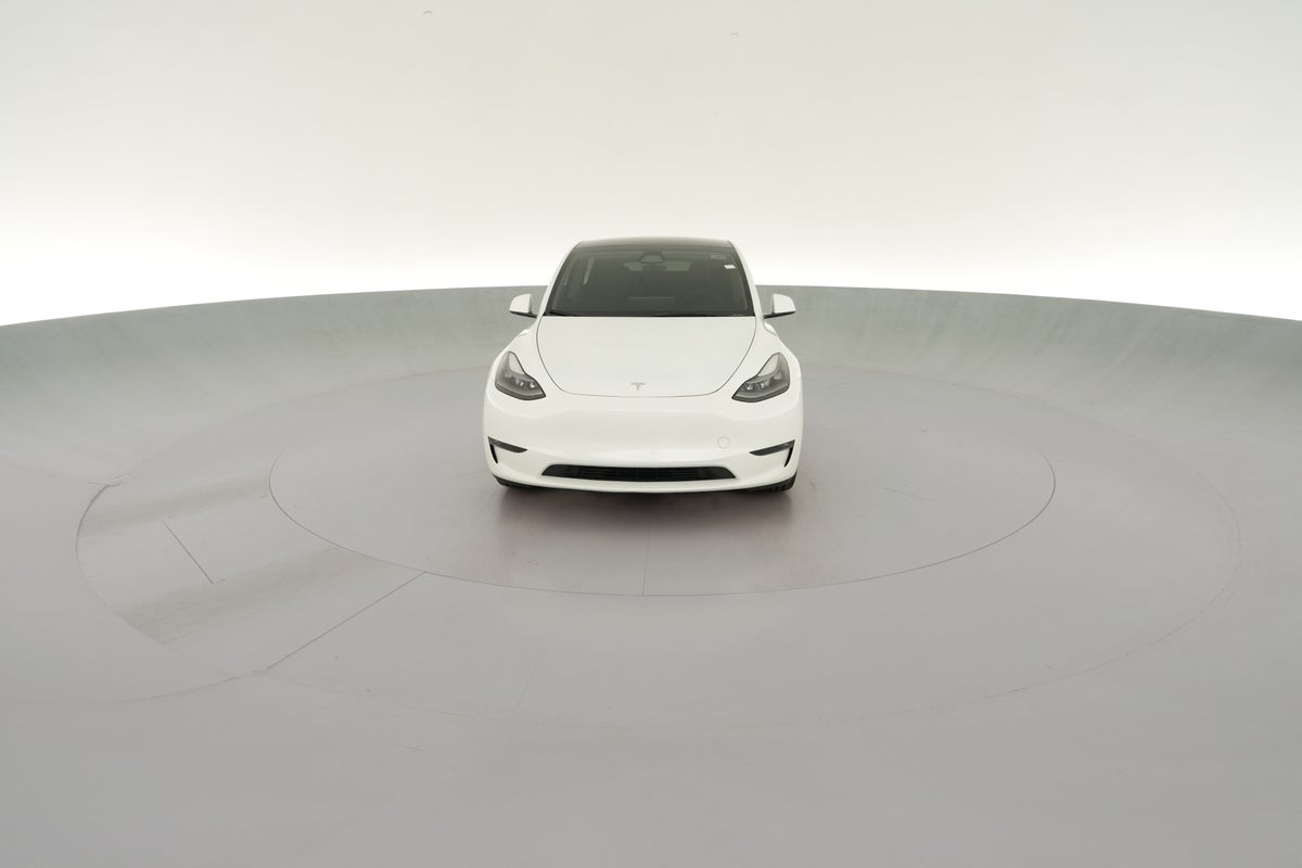 2024 Tesla Model Y Long Range All-Wheel Drive in Pearl White — 360° view 1
