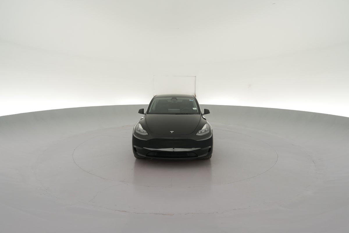 2023 Tesla Model Y Long Range All-Wheel Drive in Solid Black — 360° view 1