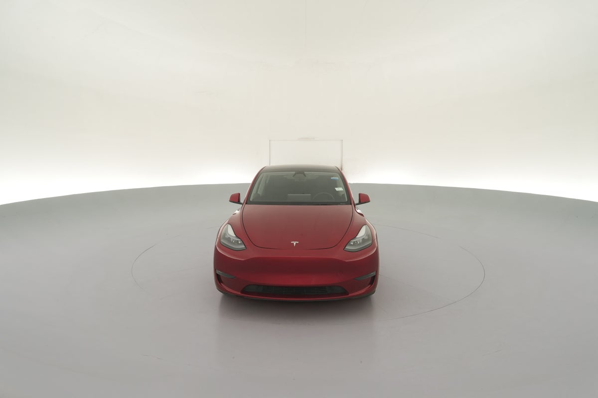 2025 Tesla Model Y Long Range All-Wheel Drive in Ultra Red — 360° view 1