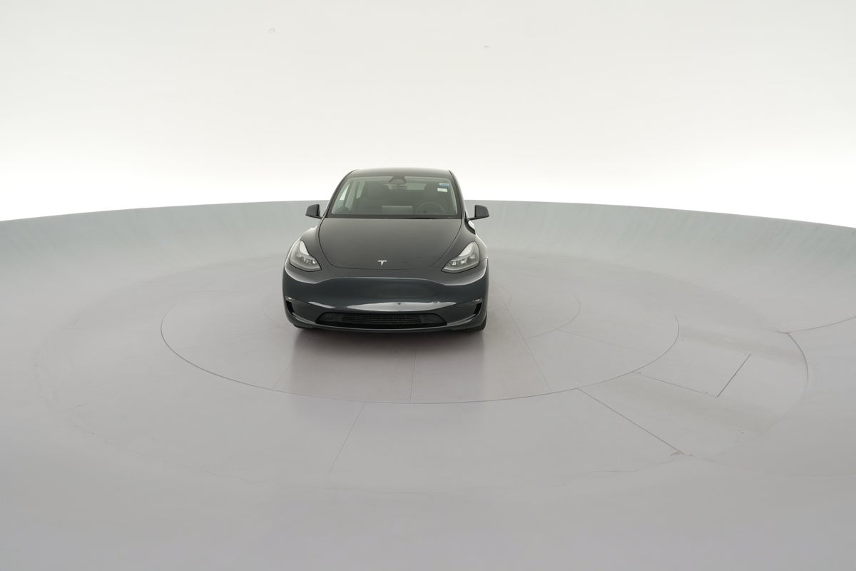 2025 Tesla Model Y Long Range All-Wheel Drive in Stealth Grey — 360° view 1