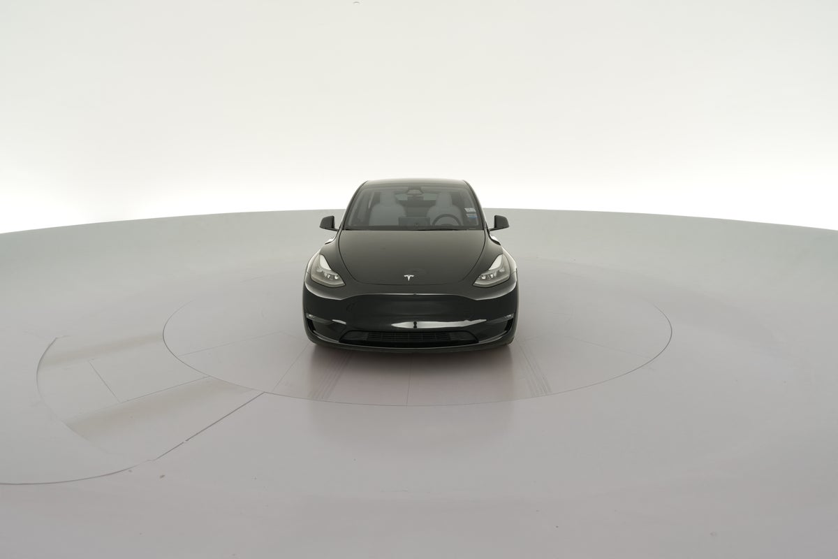 2024 Tesla Model Y Performance All-Wheel Drive in Solid Black — 360° view 1