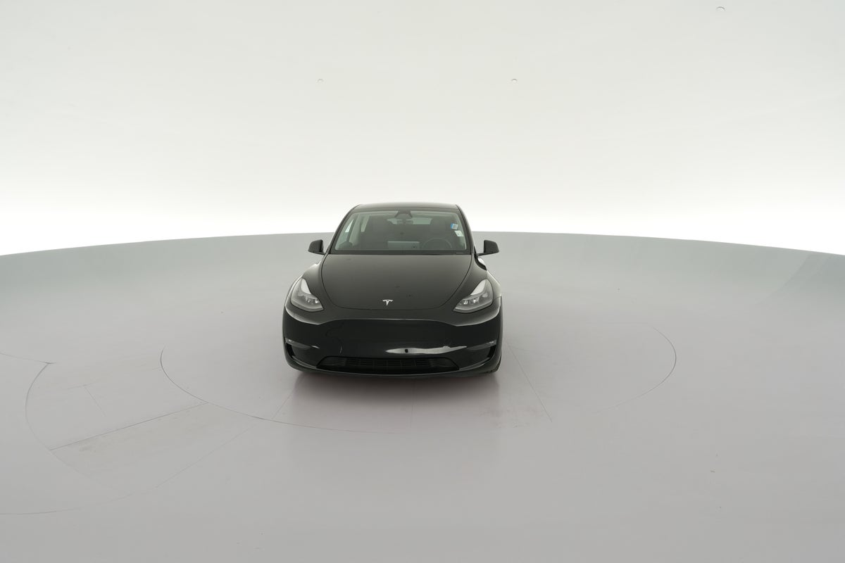 2023 Tesla Model Y Performance All-Wheel Drive in Solid Black — 360° view 1
