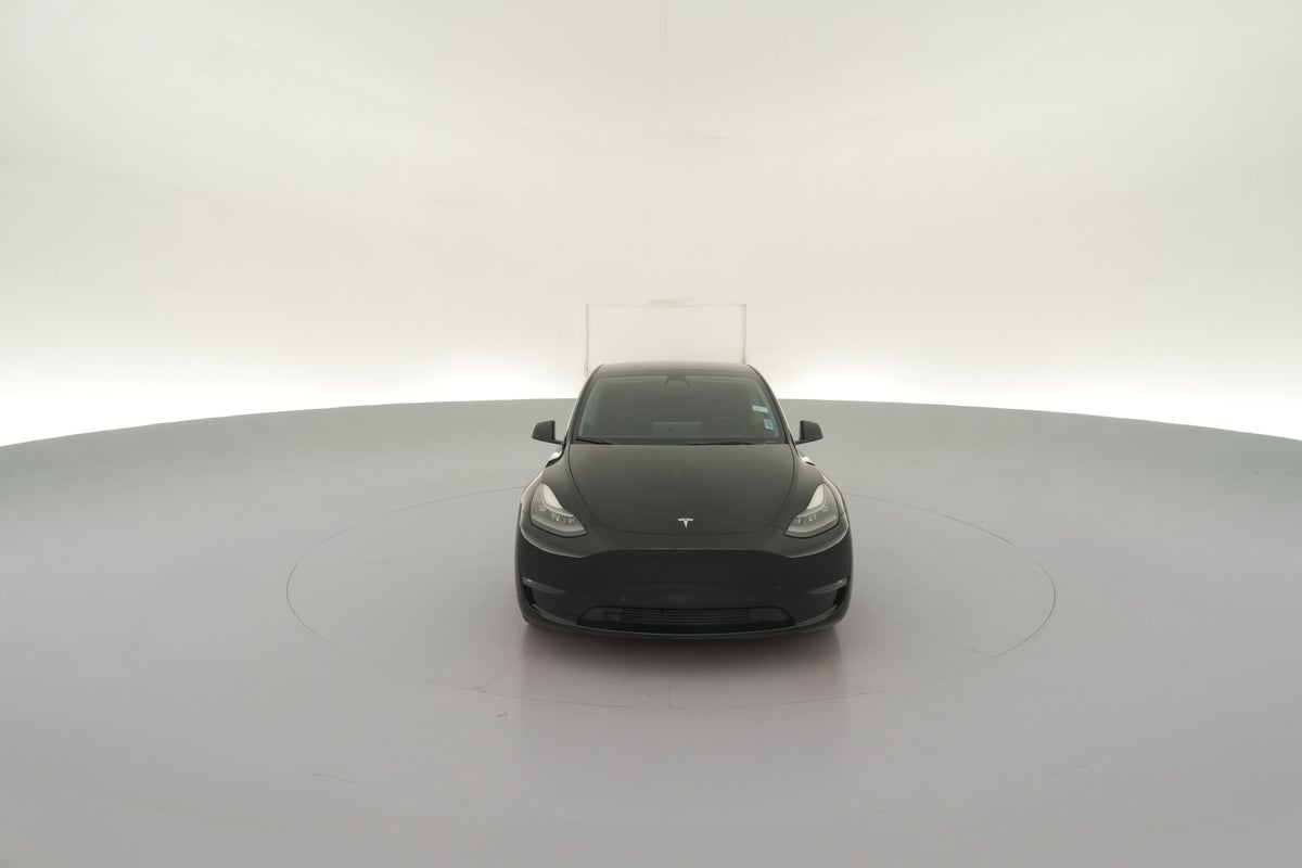 2022 Tesla Model Y Performance All-Wheel Drive in Solid Black — 360° view 1