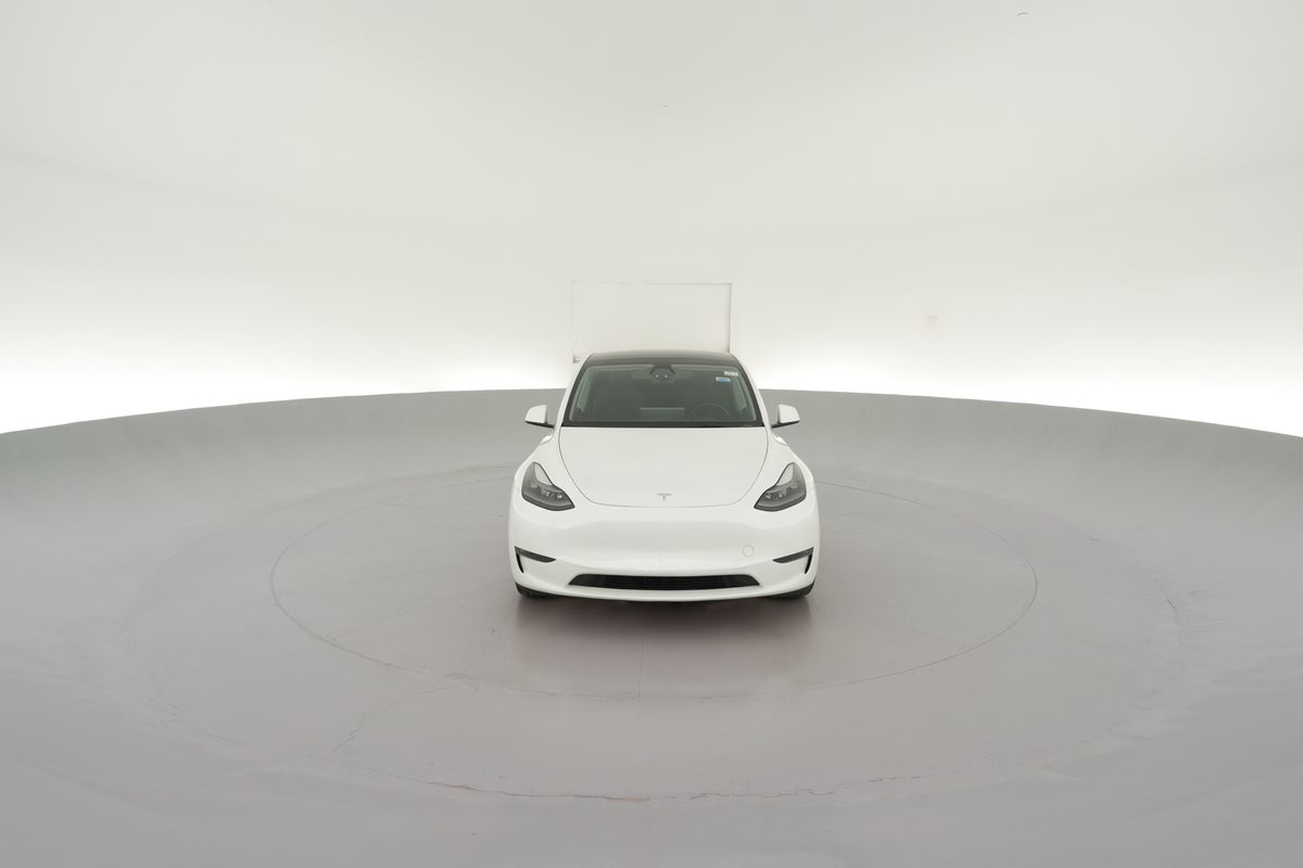2024 Tesla Model Y Long Range All-Wheel Drive in Pearl White — 360° view 1