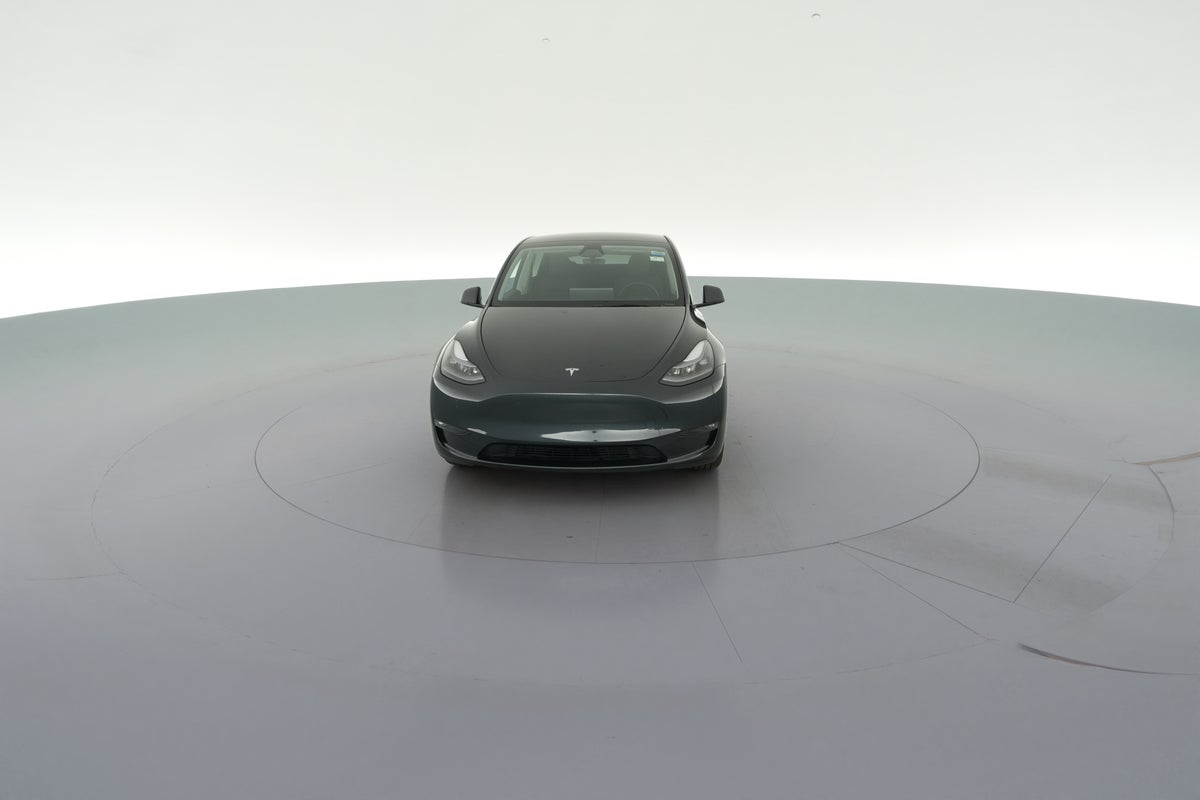 2025 Tesla Model Y Long Range All-Wheel Drive in Stealth Grey — 360° view 1