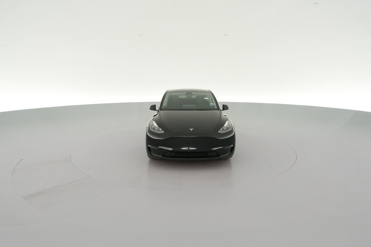 2024 Tesla Model Y Performance All-Wheel Drive in Solid Black — 360° view 1