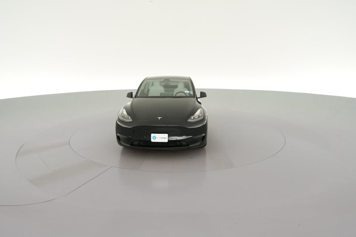 2022 Tesla Model Y Performance All-Wheel Drive in Solid Black — 360° view 1