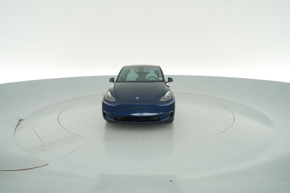2023 Tesla Model Y Long Range All-Wheel Drive in Deep Blue Metallic — photo 2