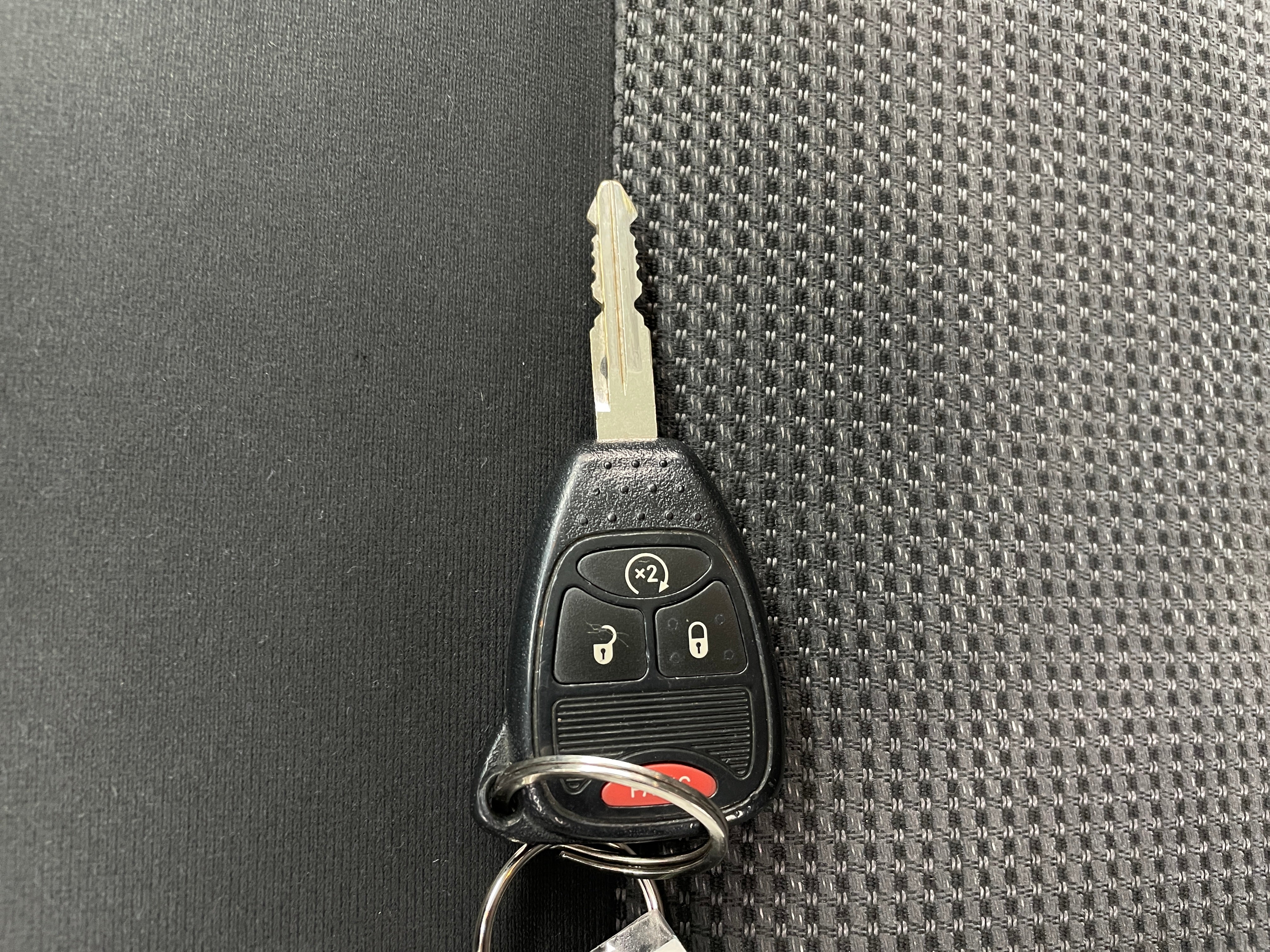 Used 2012 Jeep Compass Latitude with VIN 1C4NJDEB0CD577449 for sale in Pewaukee, WI