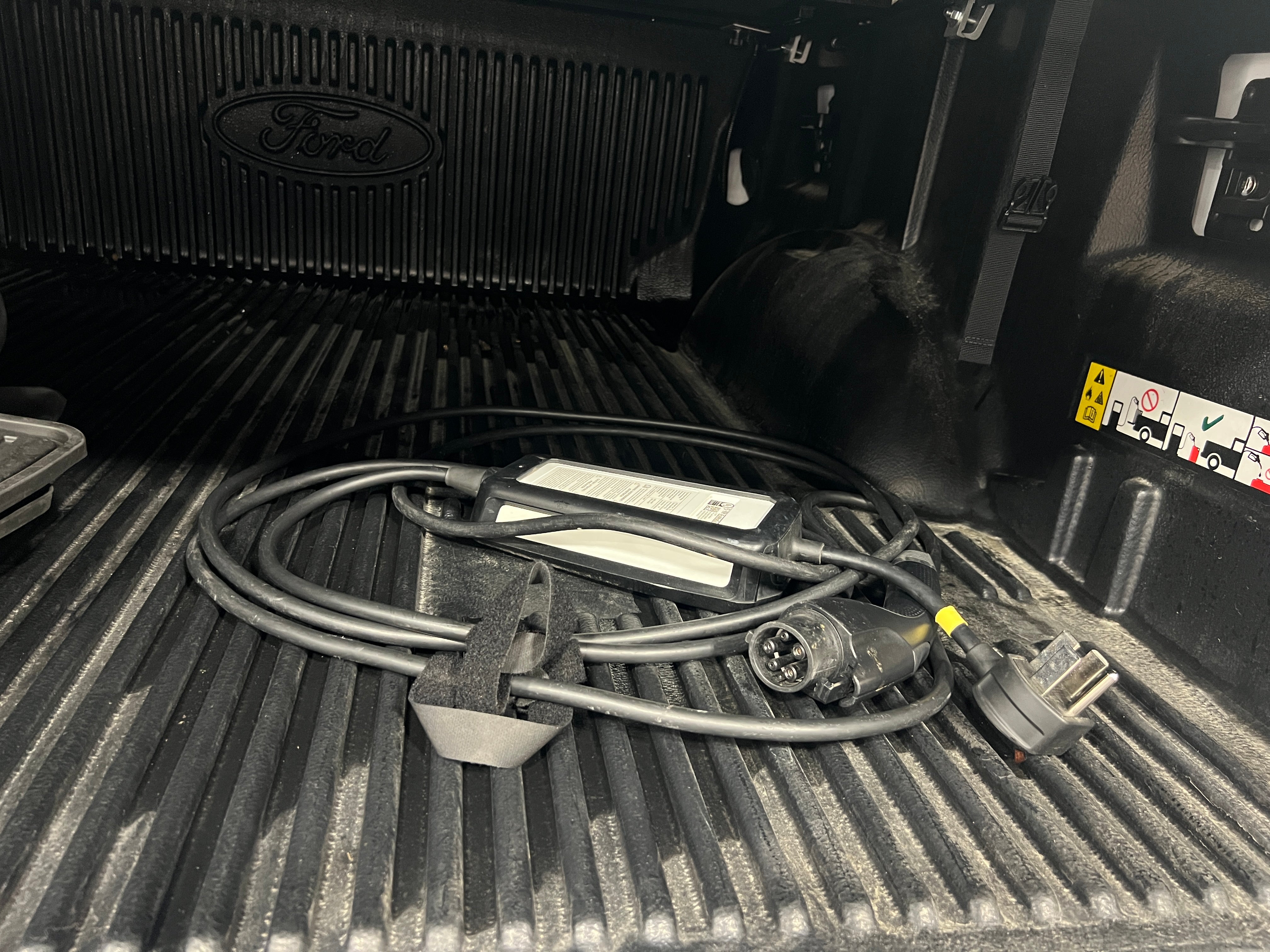 Used 2023 Ford F-150 Lightning XLT with VIN 1FT6W1EV7PWG22637 for sale in Pewaukee, WI