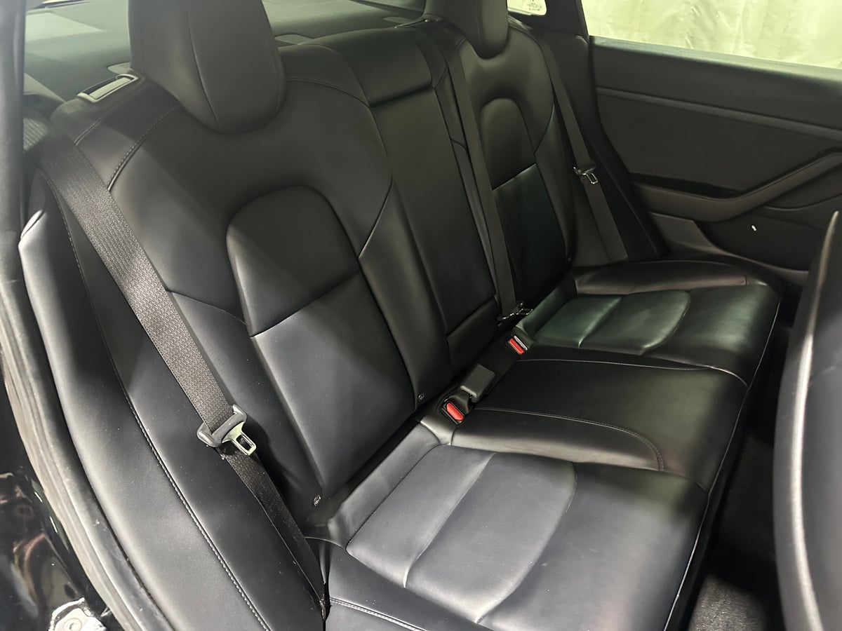 2021 Tesla Model 3 Long Range All-Wheel Drive in Solid Black — photo 2
