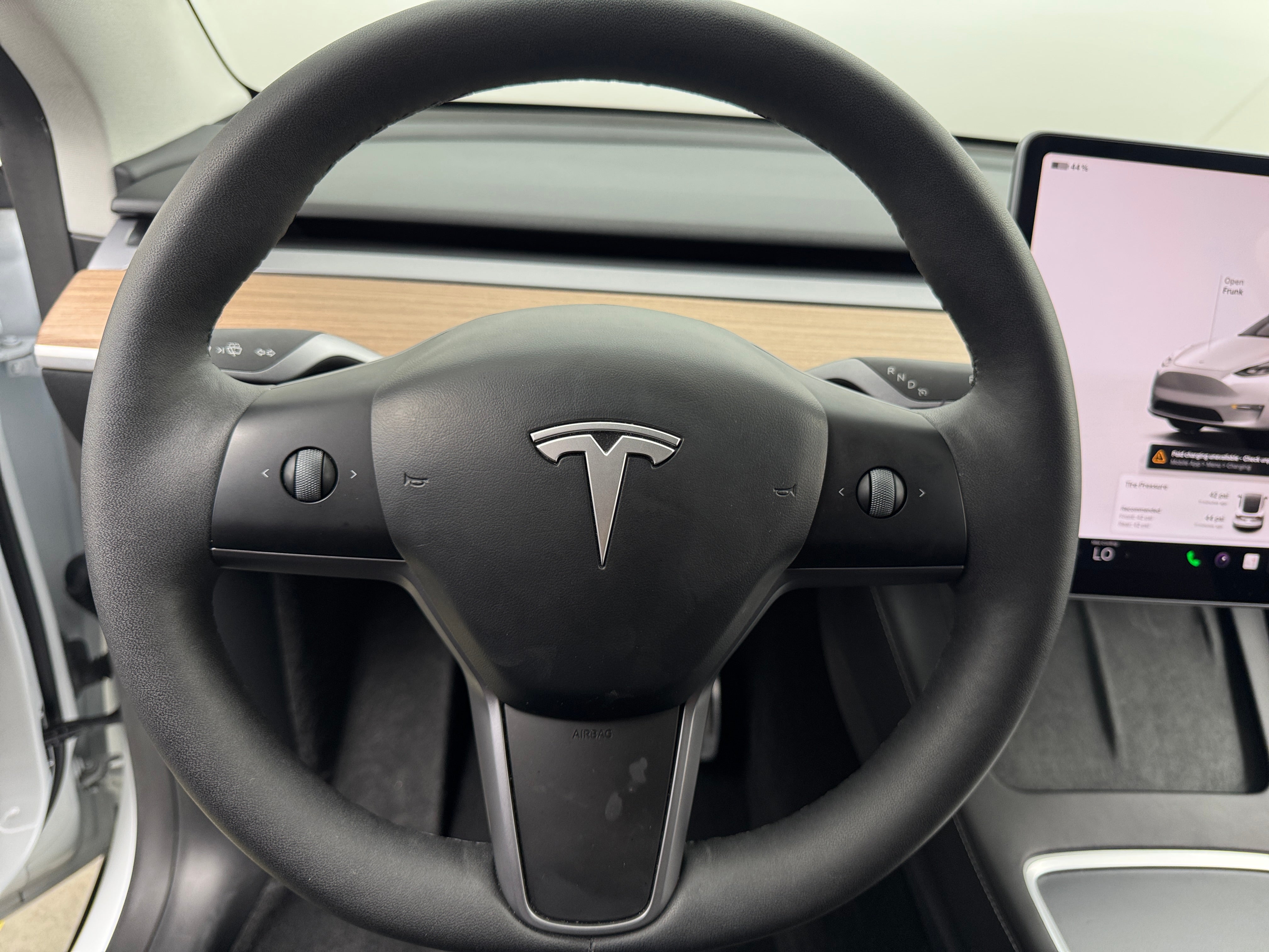 Used 2024 Tesla Model Y Long Range with VIN 7SAYGAEE1RF128323 for sale in Pewaukee, WI