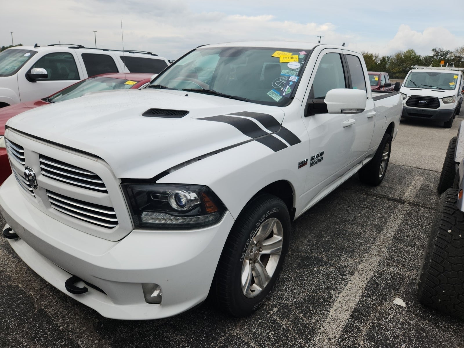 2015 Ram 1500 4WD Quad Cab 140.5" Sport