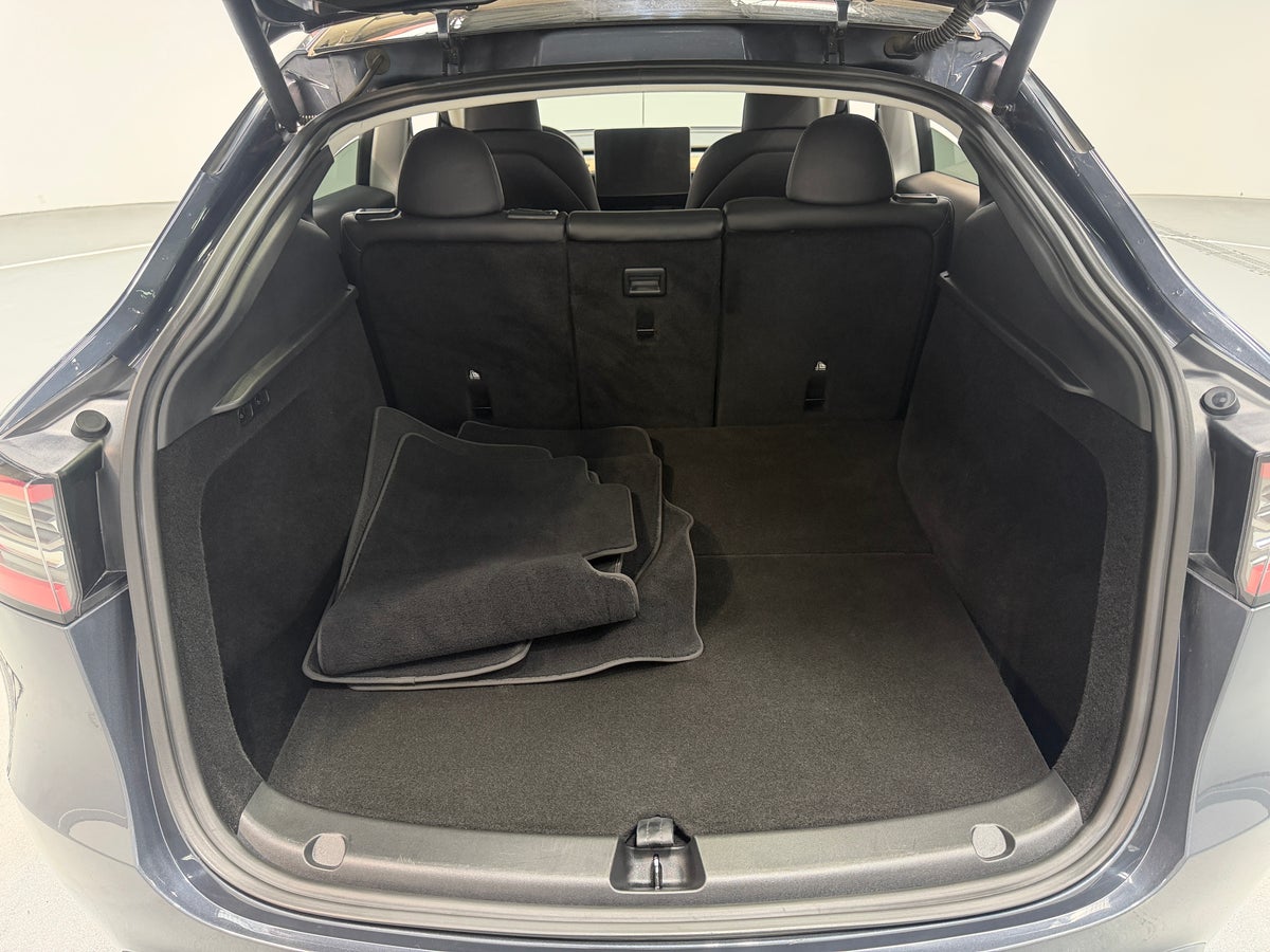 2023 Tesla Model Y Long Range All-Wheel Drive in Midnight Silver Metallic — photo 2