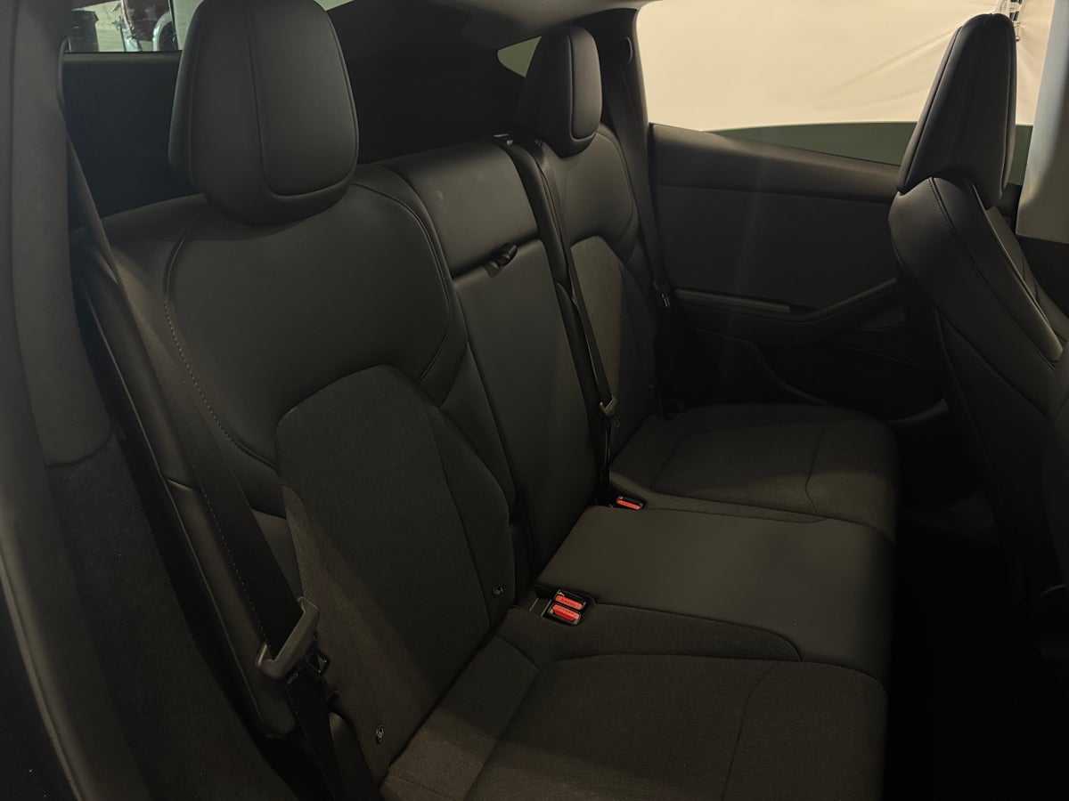 2026 Tesla Model Y Rear-Wheel Drive in Stealth Grey — photo 2