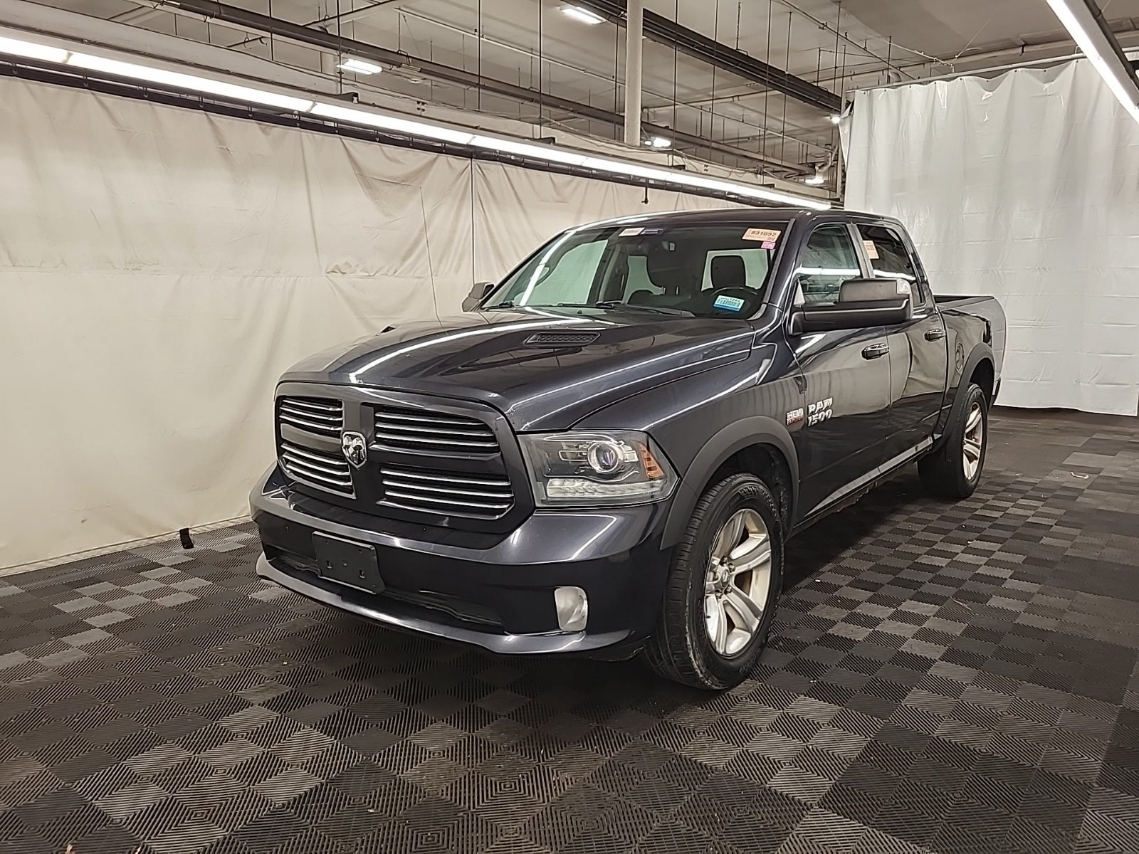 2014 Ram 1500 4WD Crew Cab 140.5" Sport