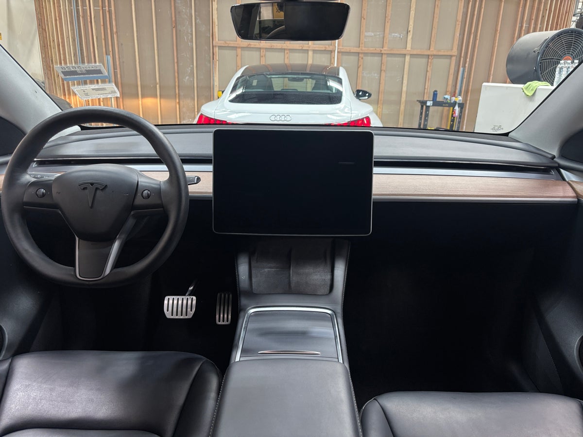 2022 Tesla Model Y Performance All-Wheel Drive in Solid Black — photo 2