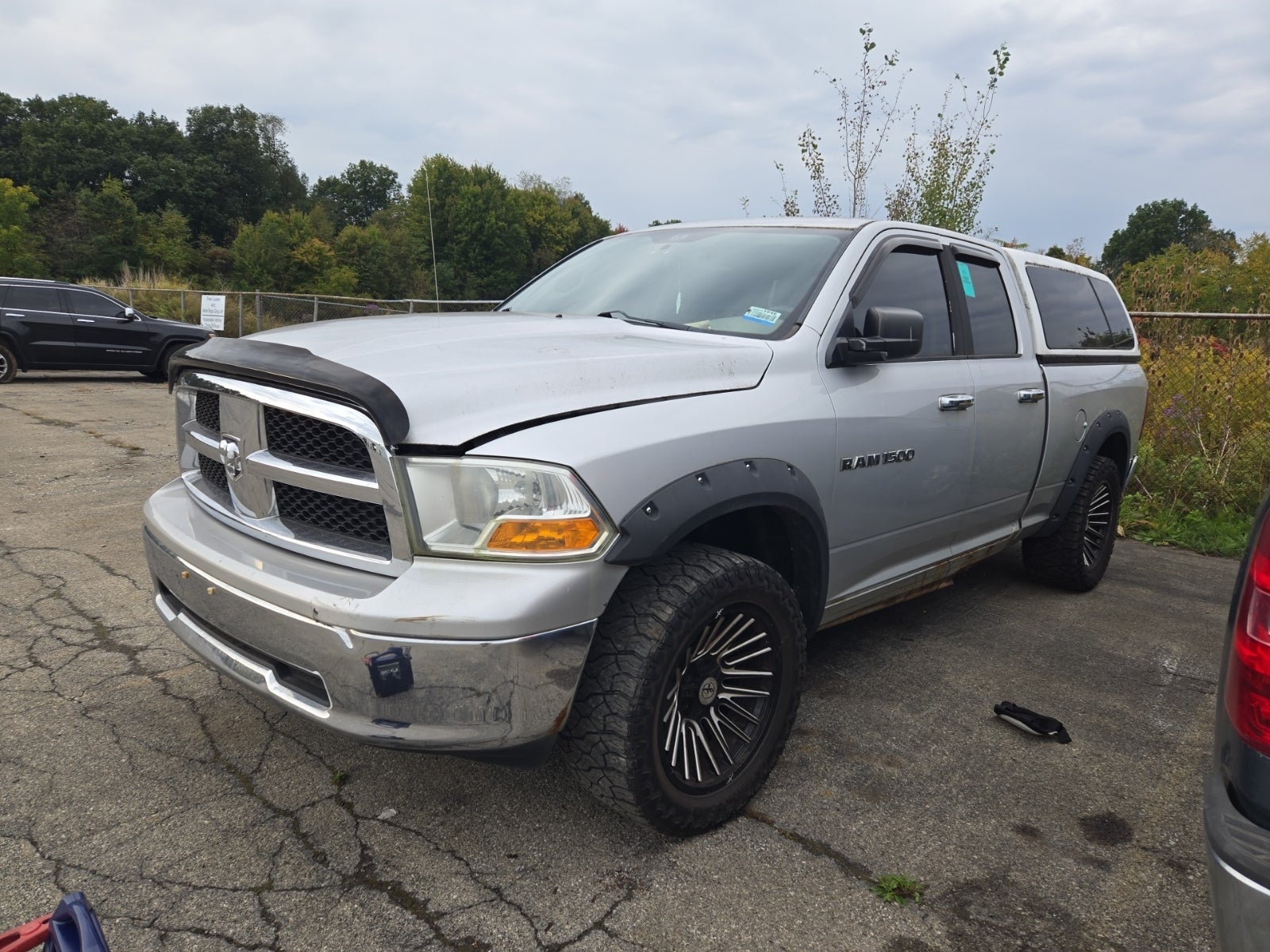2011 Ram Ram 1500 4WD Quad Cab 140.5" SLT