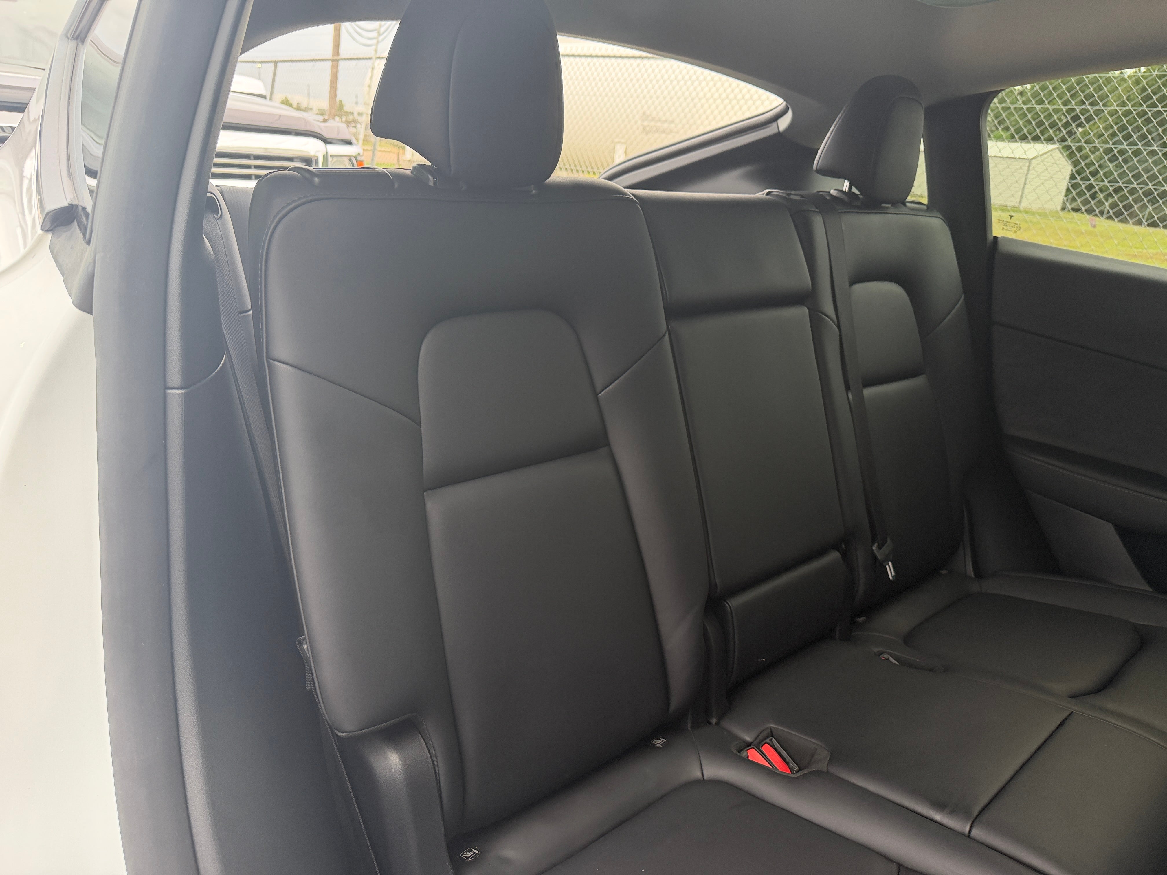 Used 2024 Tesla Model Y Long Range with VIN 7SAYGAEE7RF070489 for sale in Auburn, WA