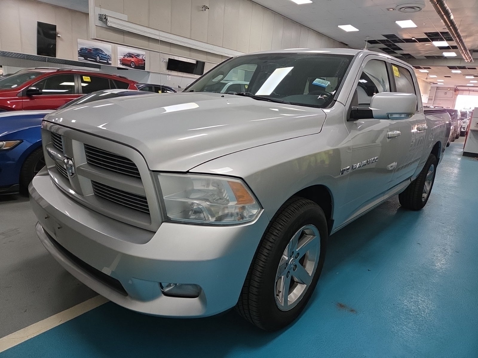 2011 Ram Ram 1500 4WD Crew Cab 140.5" Sport