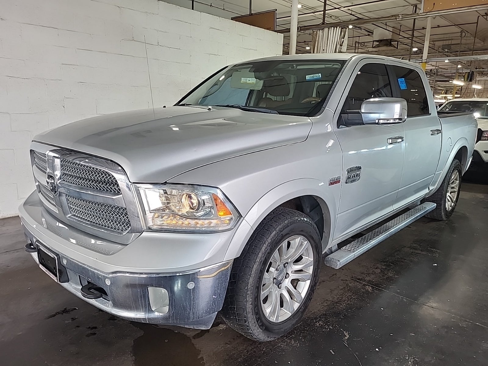 2015 Ram 1500 4WD Crew Cab 140.5" Laramie Longhorn