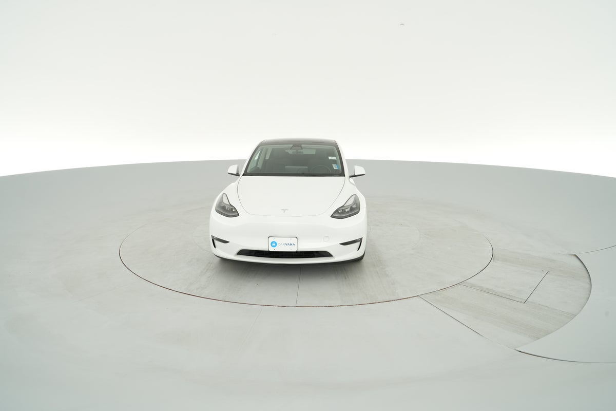 2023 Tesla Model Y Performance All-Wheel Drive in Pearl White — photo 2