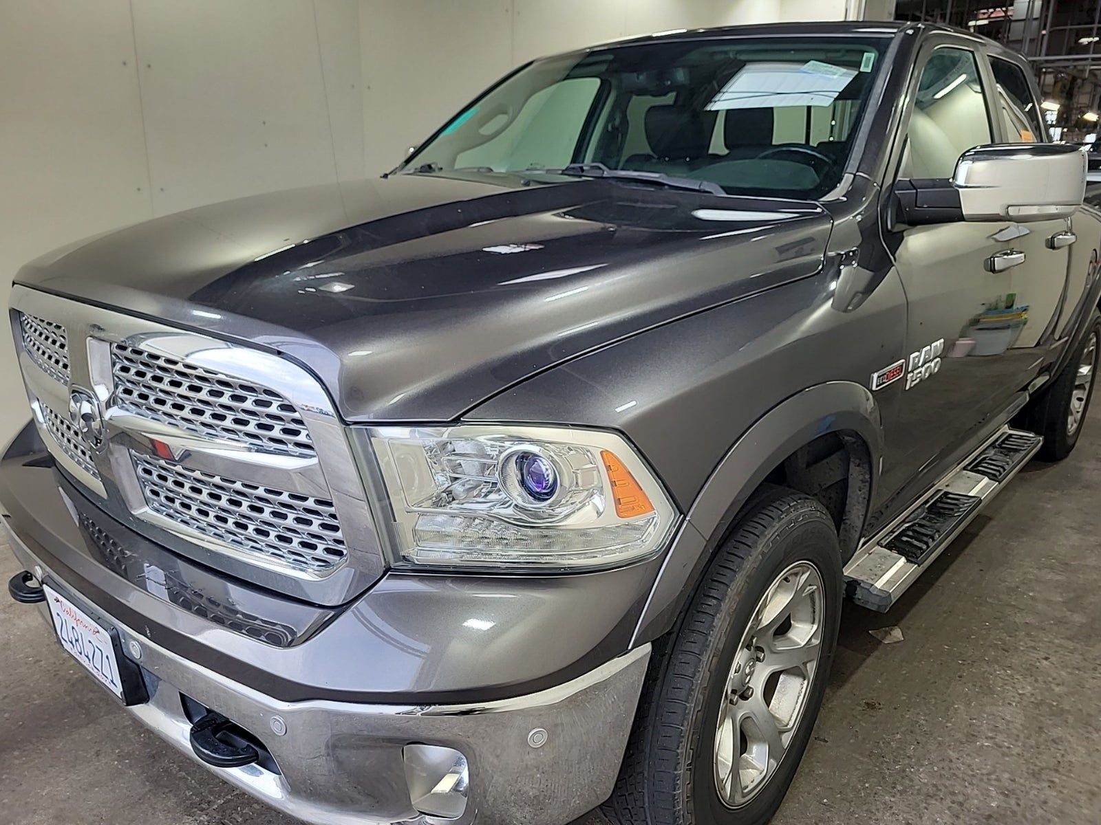 2016 Ram 1500 4WD Quad Cab 140.5" Laramie