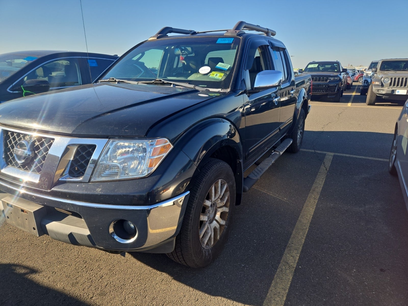 2009 Nissan Frontier 4WD Crew Cab SWB Auto LE