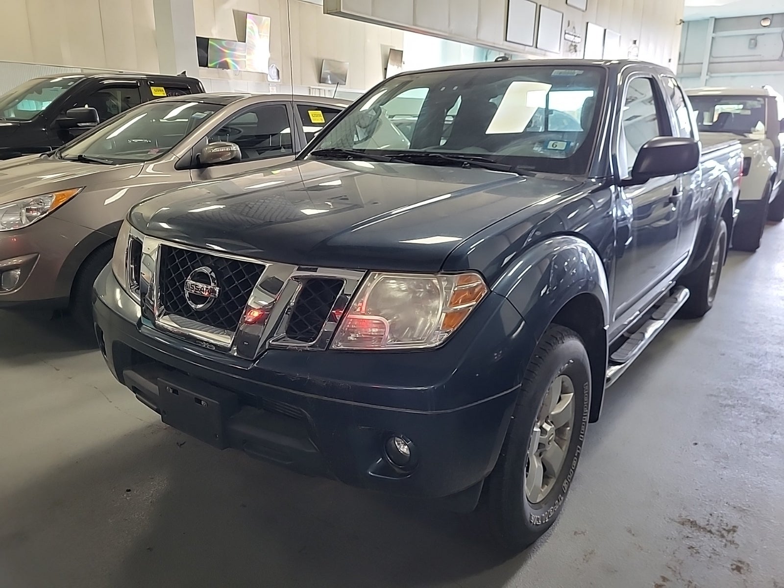 2013 Nissan Frontier 4WD King Cab Auto SV