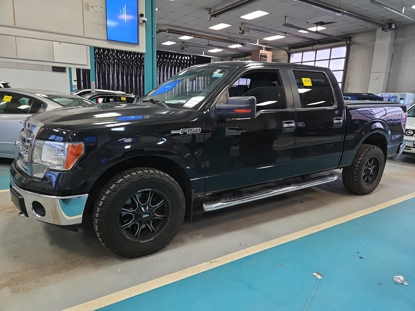 2014 Ford F-150 4WD Supercrew 145" XLT